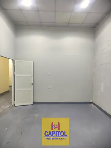 Efficient warehouse unit designed for storage and operations with clean interiors and practical space usage in Al Quoz 4