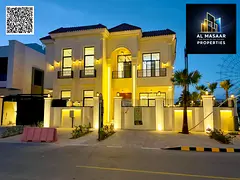 Luxury villa on a corner lot overlooking Al Hamidiya Park, with a private garden and swimming pool
