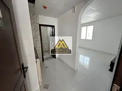 A very spacious studio for annual rent in Liwara 1 – Ajman, featuring excellent finishing, a separ