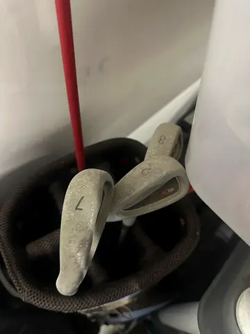 Used set of LEFT handed golf clubs with 2 carry bags