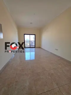 2BR hall for annual rent in Al Jurf 3 Ajman, 2 balconies, open view, spacious kitchen, excellent sp