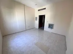 Studio for rent in Al Rashidiya 2 Ajman AED 18,000 yearly semi open kitchen central AC spacious nea