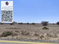 Corner plot for sale in Ajman - Al Manama 8, On the asphalt road.