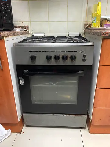 Used Stainless Steel Gas Oven and Stove - 4 Burners in excellent working condition