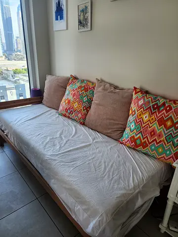 Single bed with mattress and 4 large cushions