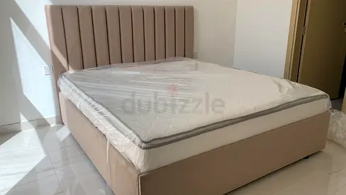Beige Upholstered Queen Bed with Headboard — Almost New