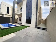 Luxury villa for sale with a swimming pool and spacious yard, price includes registration fees.