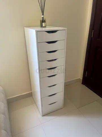 Slim white multi-drawer storage cabinet - tall organizer