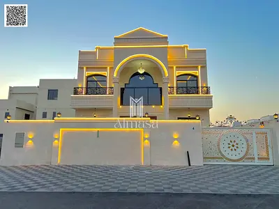 Villa for sale, including registration and ownership fees, near all services, close to Sheikh Mohammed Bin Zayed Road, on a main street, very prime lo