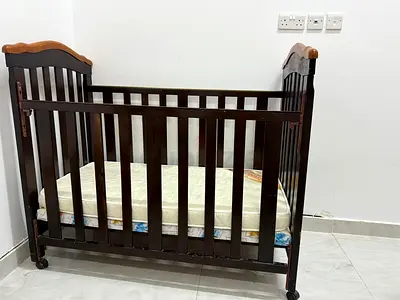 Brown Wooden Baby Crib with mattress - Good Condition
