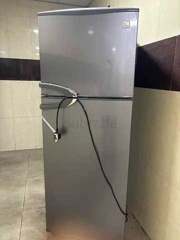 Used Silver Top-Freezer Refrigerator - Good Working Condition