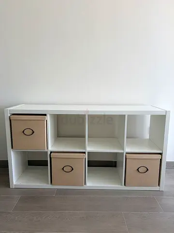 IKEA shelving unit with storage boxes