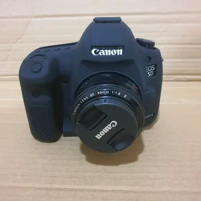 Canon EOS 5D (body) with Canon 50mm f/1.8 lens - original bag  charger  batteryCAED  Strap