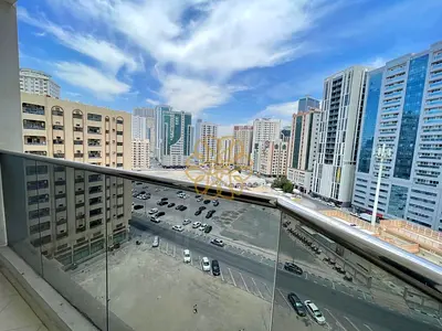Parking Free 2 Bedroom apartment with Balcony with open view In Al Majaz 2 Area