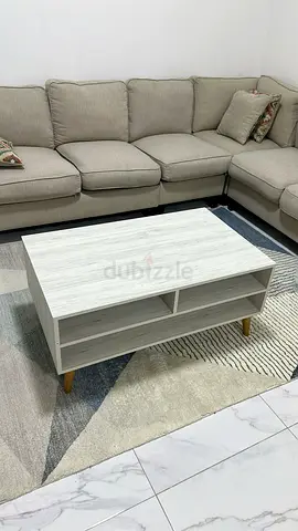 Light Wood Coffee Table with Open Shelves and 2 cabinet drawers - Good Condition