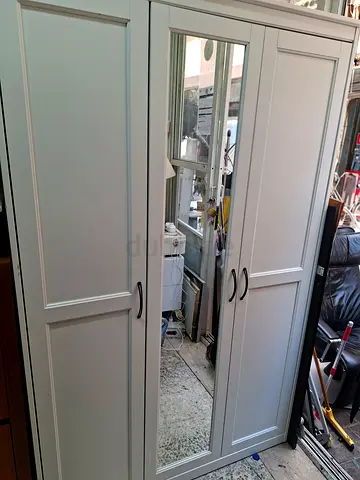 I want to sell this three door cabinet use but all very nice and good condition
