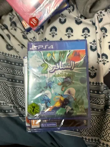 PS4 game — The Smurfs Adventure (sealed, Arabic cover)