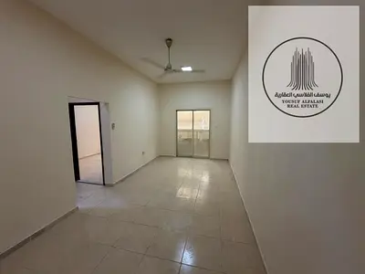 A spacious one-bedroom apartment with a living room is available in a prime location close to servi