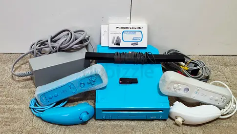 Nintendo Wii with all cables, 2 controllers and more than 50 games