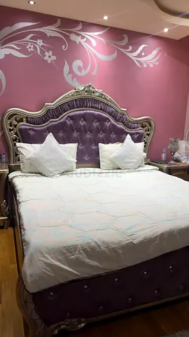 Ornate Purple Upholstered King Bed with Matching Headboard