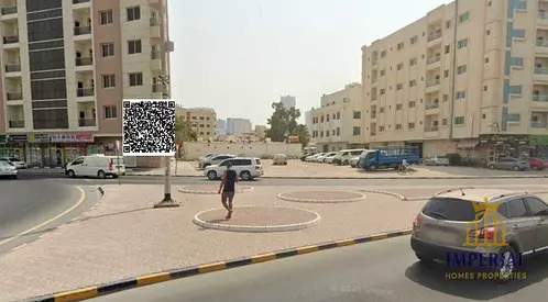Residential and commercial plot on the ground floor of Al-Ashidiyah Ladies’ Garden, in a prime location in Al-Rashidiyah 3, Ajman