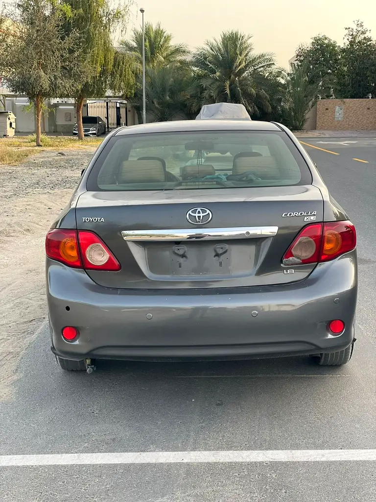 Toyota Corolla 2010 — photo 1 of 11