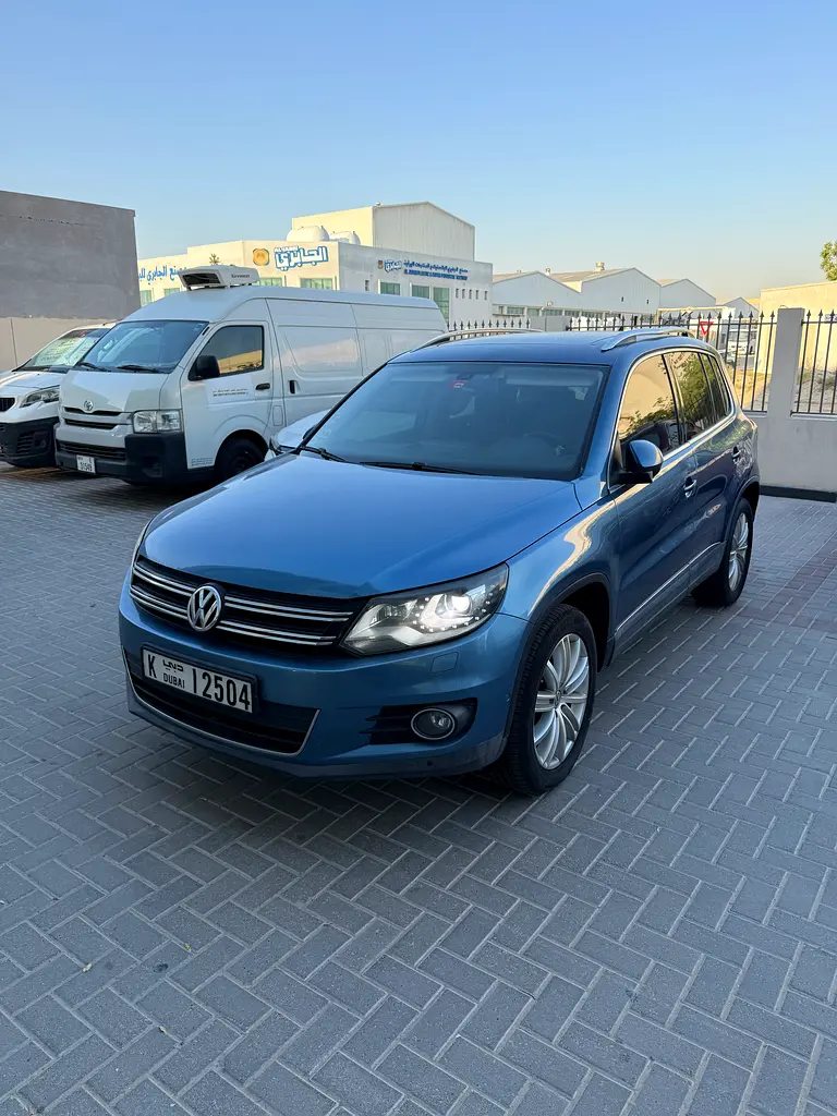 Volkswagen Tiguan 2015 — photo 1 of 4