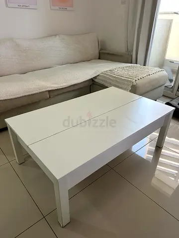 White coffee table with storage good condition. 2 years old. Bought originally for 400 AED
