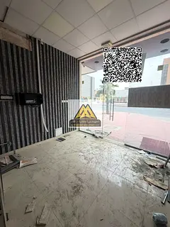 Commercial Shop for Rent in Al Rawda 3 | Sheikh Ammar Main Road | Prime Location + 35 Sq. M + High V