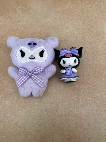 Small purple Kuromi stuffed plushie with matching collectible figure - good condition
