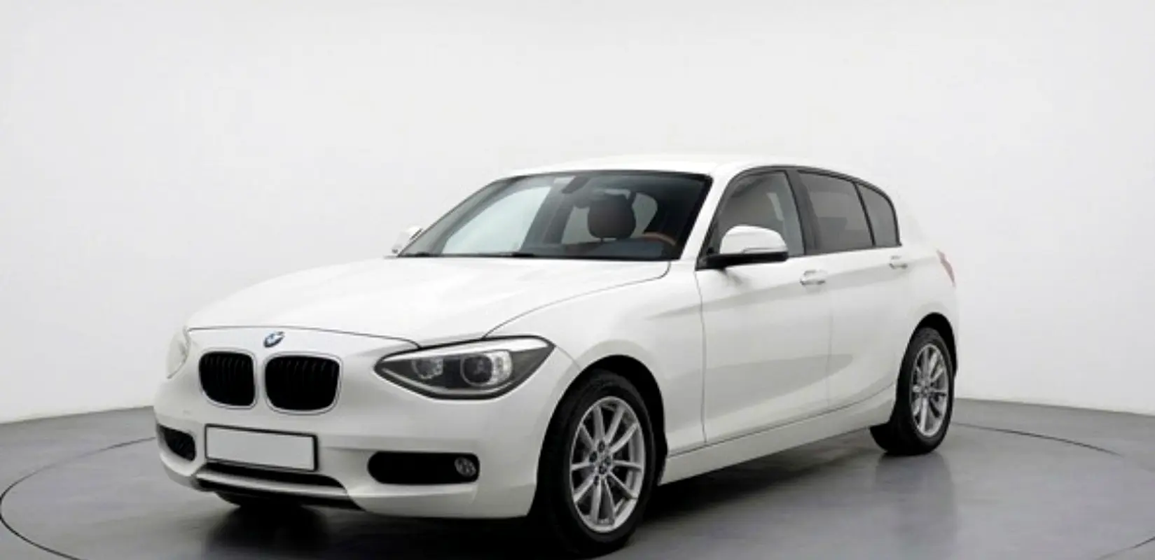 BMW 1-Series 2014 — photo 1 of 7
