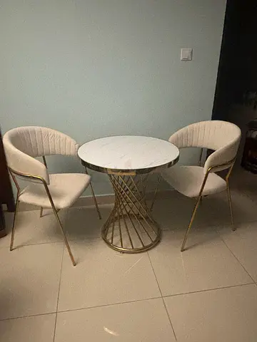 Small elegant table and two chairs set