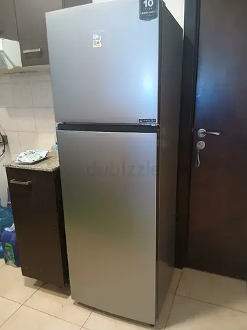 Silver double-door refrigerator - good condition