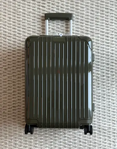 Rimowa Essential cabin suitcase in a glossy green
