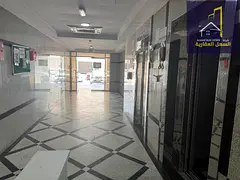 Building for sale in Muwailih area, directly on a main street.