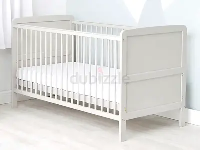 Branded cot and mattress in excellent condition ( original price was 1600)