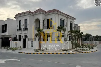 A luxurious villa with a modern design, high-end finishes, a private garden, and a swimming pool. T