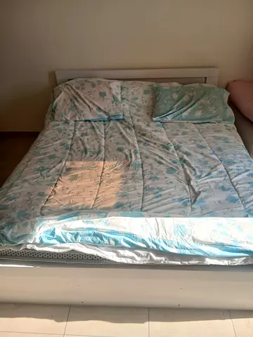 White Queen Bed Frame with Mattress and Light Blue Bedding - Used