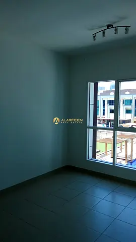 1BR Apartment | Oxford Building JVC | Balcony & Pool View
