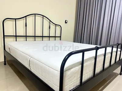 Almost new IKEA king bed frame 180cm x 200cm with mattress elegant and looks nice. 700 AED is last p