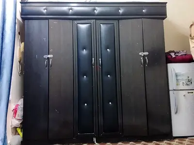 Large Dark Wooden 6-Door Wardrobe with Padded Center Panels