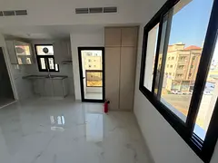 Brand new studio for rent in Al Alia Ajman balcony central AC built-in wardrobes AED 24,000 yearly