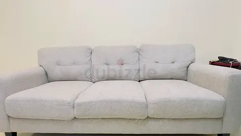 Light grey 3-seater fabric sofa in good condition