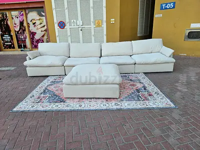 Home Center swin feather filled sofa with footstool