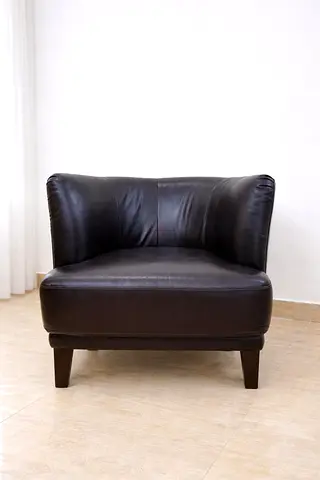 Italian leather armchair from Natuzzi Editions