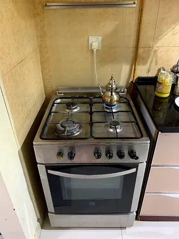 Used freestanding gas stove with oven – stainless steel, 4-burner