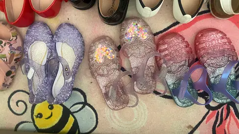 Lot of 14 pairs of childrens jelly sandals – sizes small, gently used