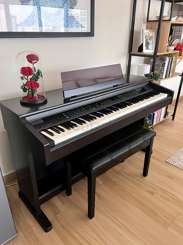 Kawai Electric Piano with Dark Wood Finish. FREE Faux leather Bench with storage