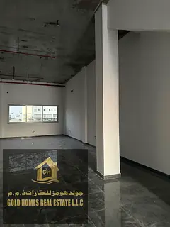 Spacious Multi-Use Shed with Mezzanine for Rent in Al Jurf Industrial 2 – High Power Electricity