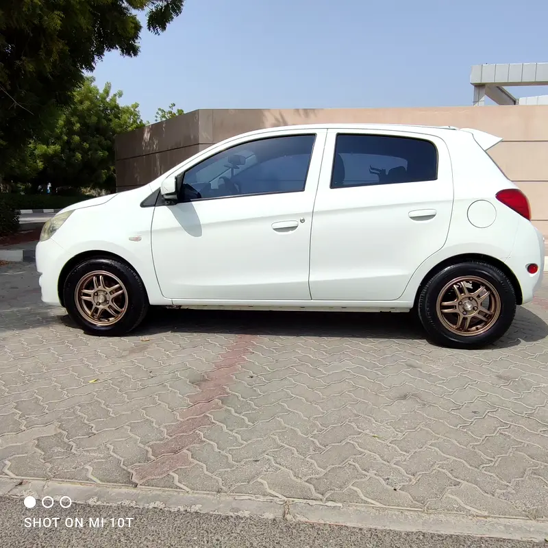 Mitsubishi Mirage 2014 — photo 1 of 9